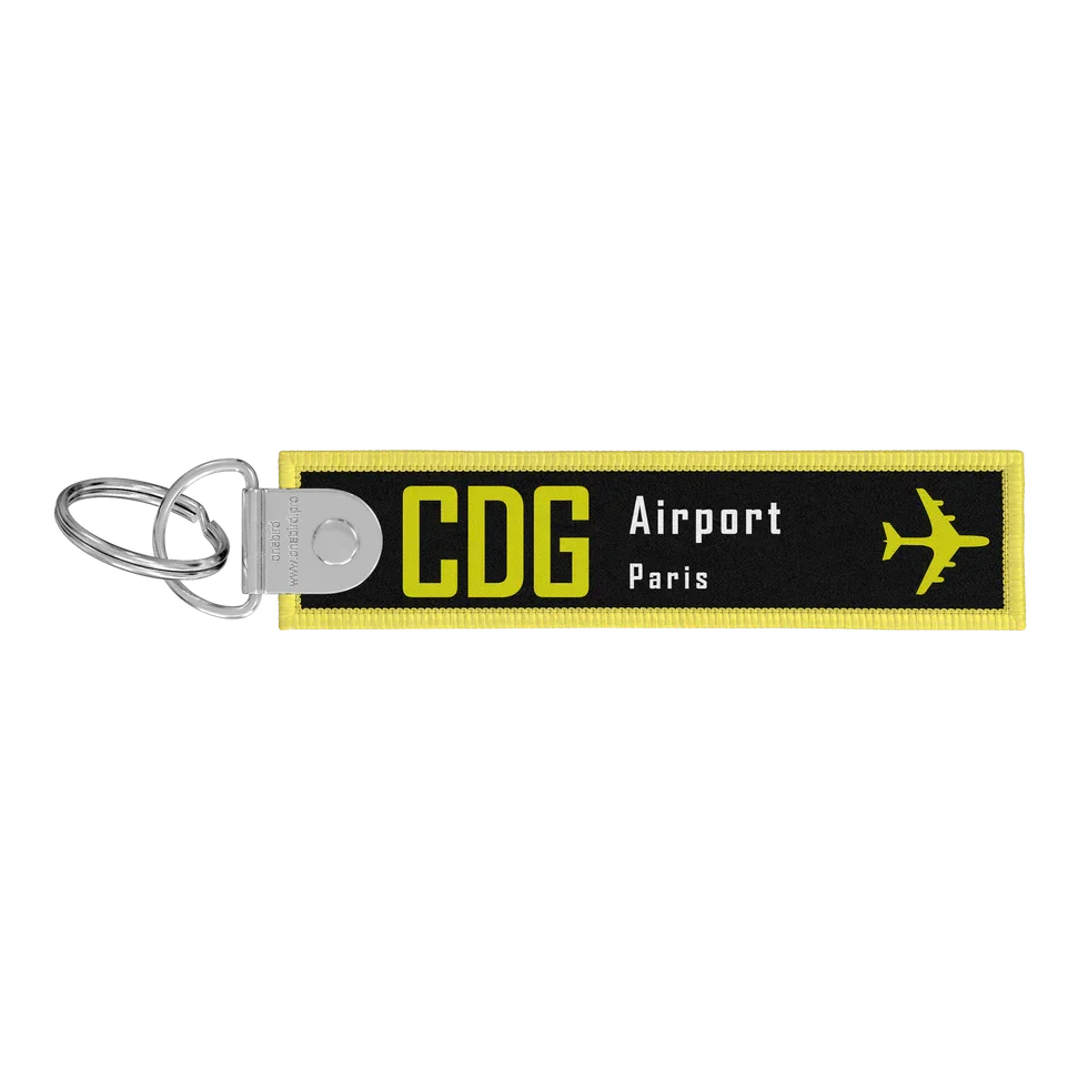 Porte-clés flamme Remove Before Flight noire / CDG