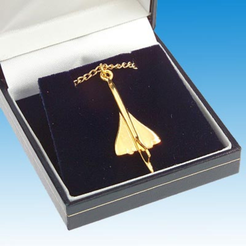 Pendentif doré reprenant la silhouette de l'avion Concorde