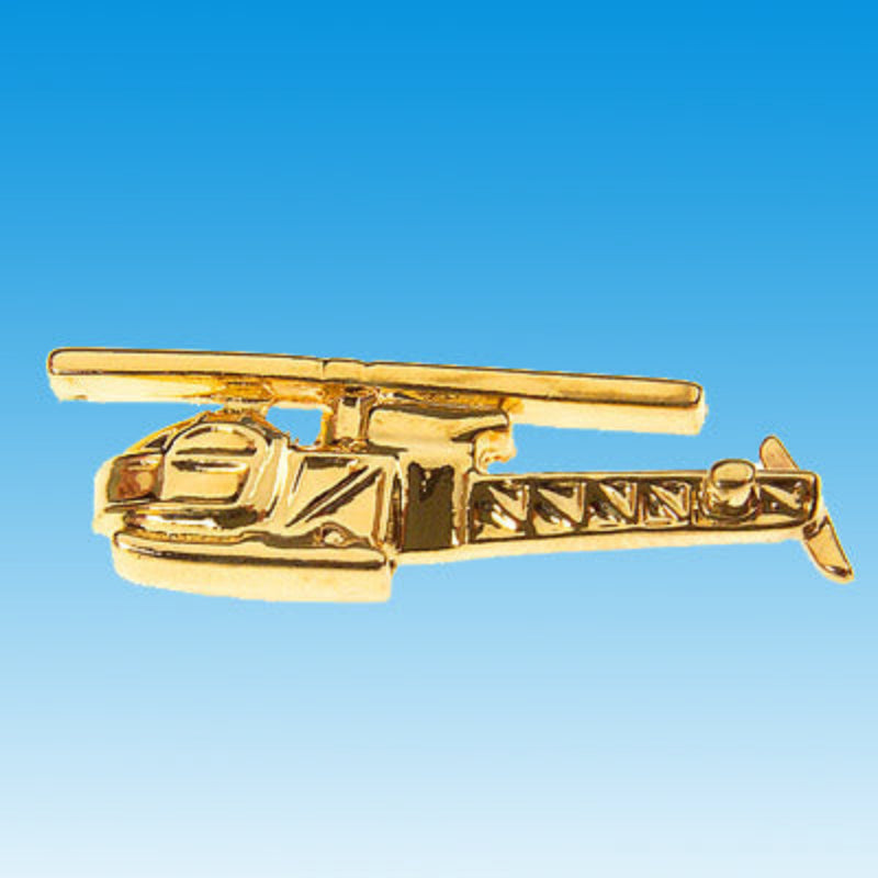 Pins doré représentant l'hélicoptère Alouette II