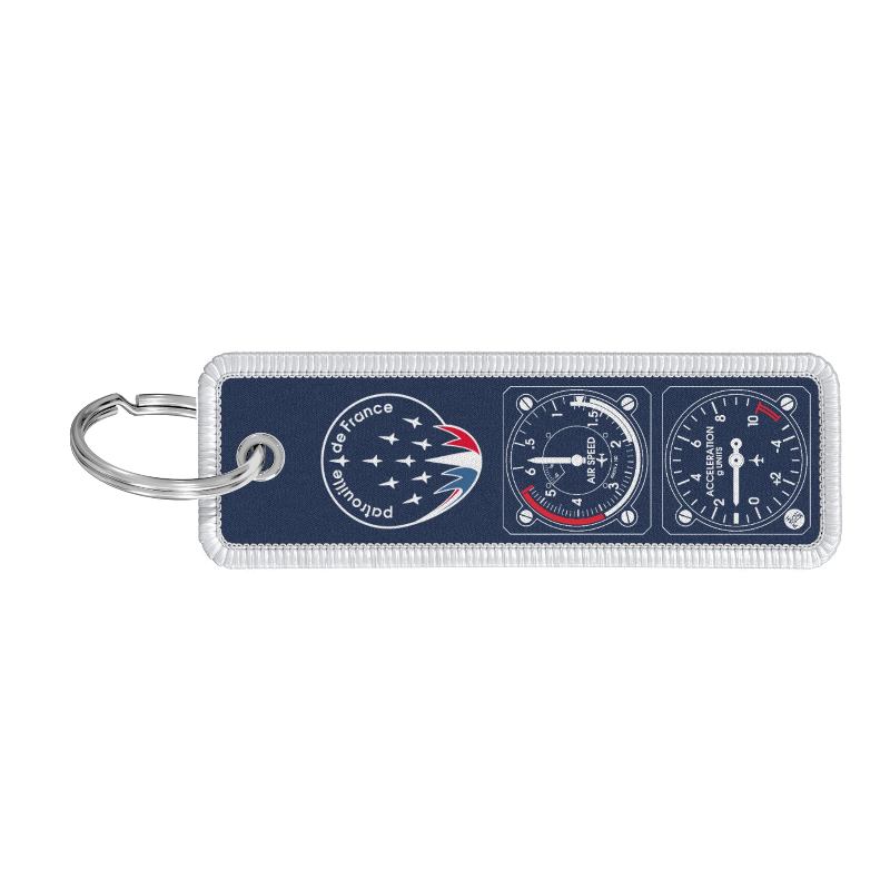 Porte-clé flamme bleu en tissu avec impression Patrouille de France et instruments de vol