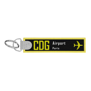 Porte-clés flamme Remove Before Flight noire / CDG