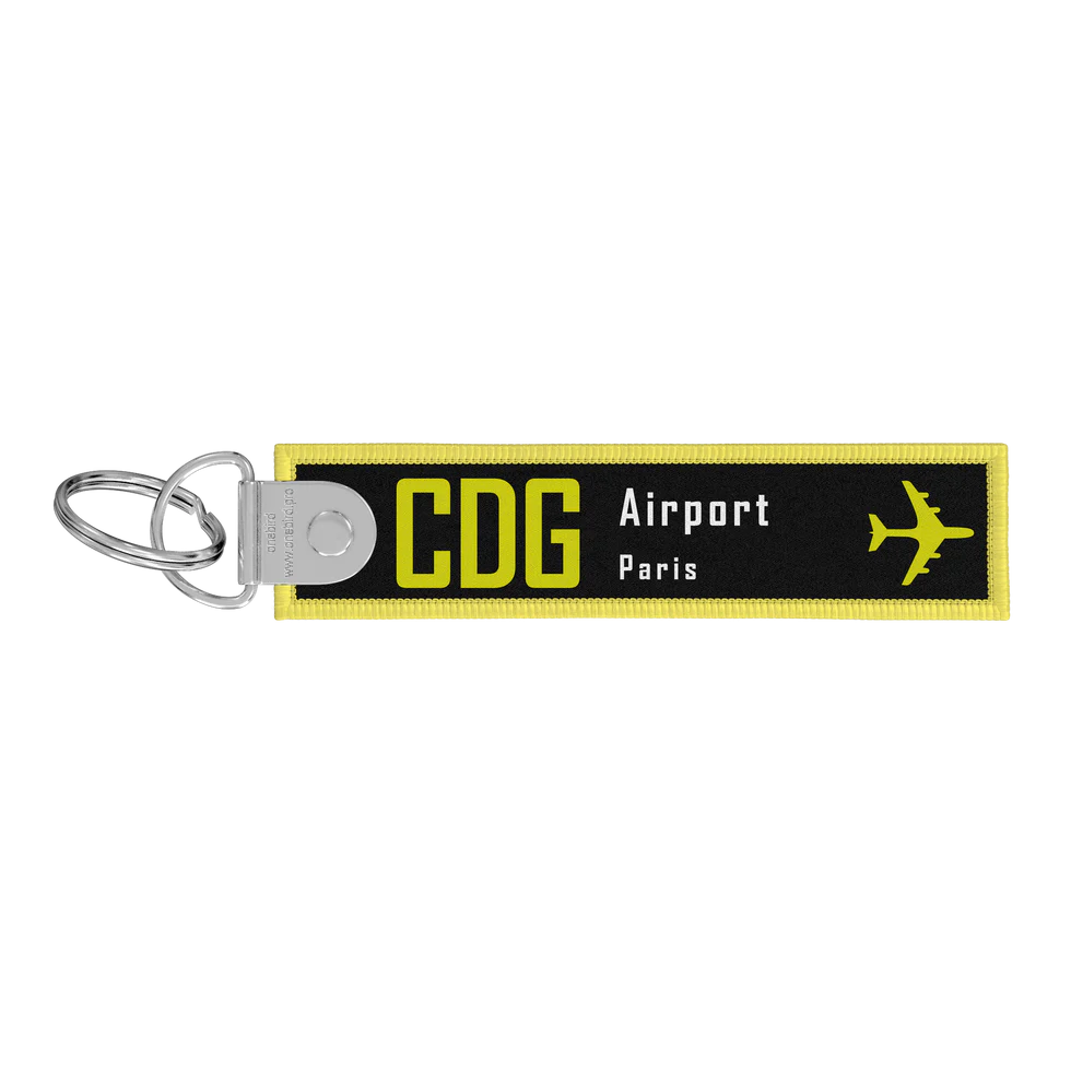 Porte-clés flamme Remove Before Flight noire / CDG