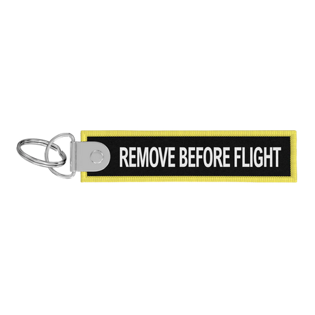 Porte-clés flamme Remove Before Flight noire / CDG